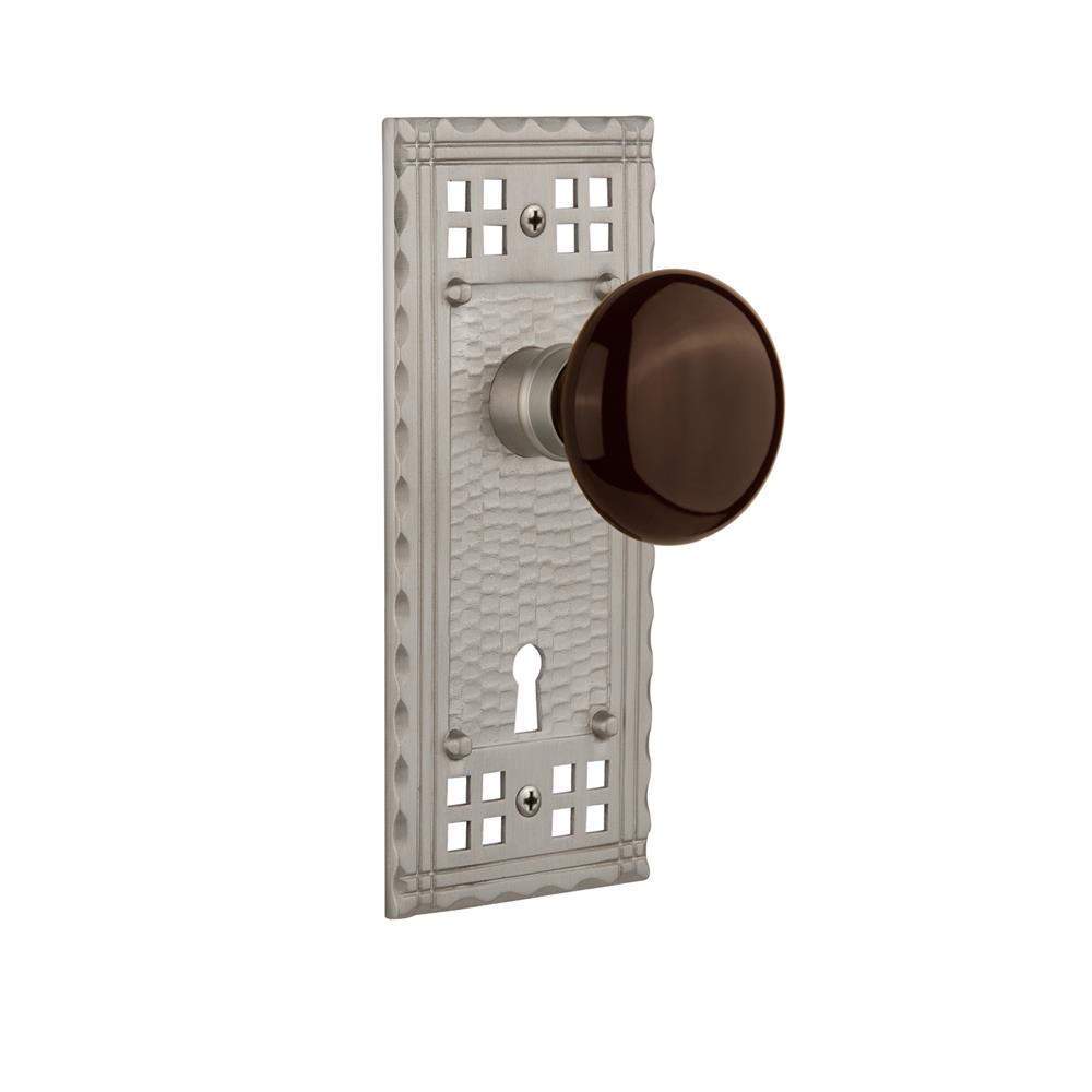 Nostalgic Warehouse CRABRN Mortise Craftsman Plate with Brown Porcelain Knob and Keyhole in Satin Nickel